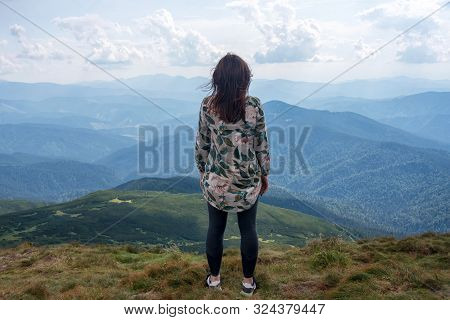 Girl Traveling In Mountains Alone, Calm Scene. Walking Outdoors, Woman Hiker On Mountain Top. Back V