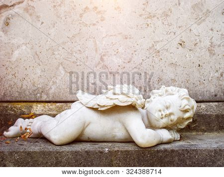 An image of a sleeping angel statue