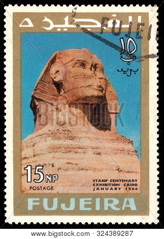 Fujeira - Circa 1966: A Stamp Printed In Fujeira Shows  Sphinx At Giza  With Inscription And Name Of