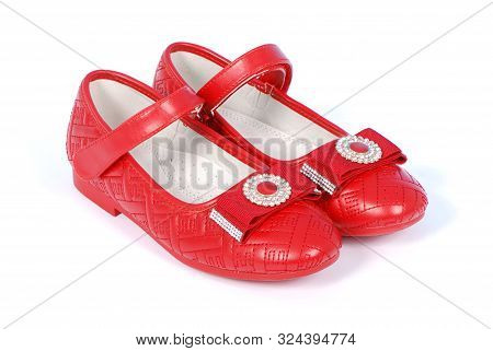 Chilren Red Shoes On White Background. High Resolution Photo. Full Depth Of Field.