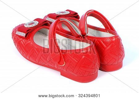 Chilren Red Shoes On White Background. High Resolution Photo. Full Depth Of Field.