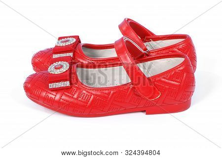 Chilren Red Shoes On White Background. High Resolution Photo. Full Depth Of Field.