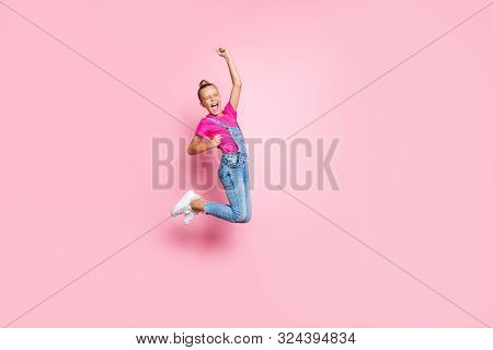 Full Length Body Size Photo Of Trendy Cheerful Ecstatic Girl Rejoicing With Victory Jumping Crazily 