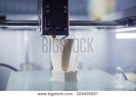 Print Head Of 3d Printer Machine Printing Plastic Model At Modern Scifi Technology Exhibition. 3d Pr