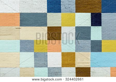 Old Historic Brick Wall Painted In Rainbow Colors