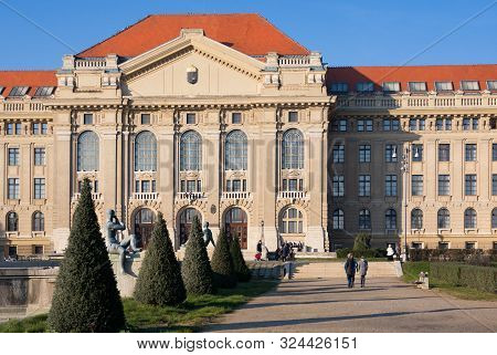 Debrecen, Hungary - November 1, 2015: Building Of Lajos Kossuth University And Sculptures In Autumn
