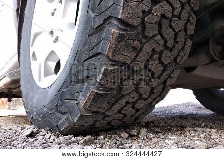 All Terrain Car Tire On A Wheel.
