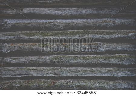 Dark Foggy Faded Toned Wooden Texture Background. Old Cracked Timber. Wooden Wall With Green And Ora
