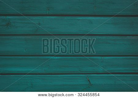 Dark Green Wooden Wall Faded Texture Background. Close Up