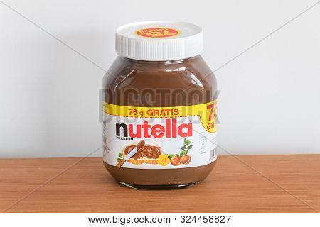 Pruszcz Gdanski, Poland - June 10, 2019: Jar Of Nutella Hazelnut On Wooden Table. Nutella Is The Bra