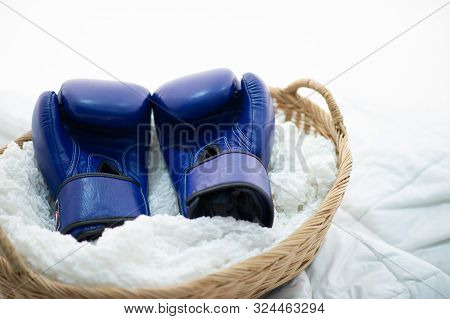 The Boxing Gloves Of The Boxers Are Placed In Whites With Hope And Determination For Boxing.