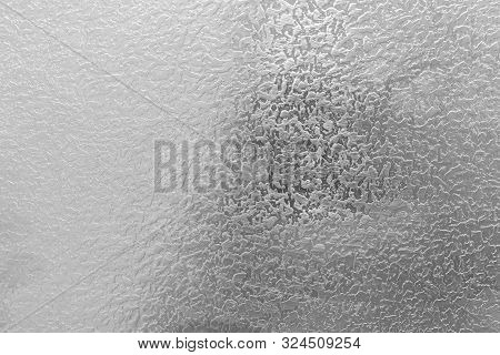 Sharpened Covering Of Light Gray Colour On Building Wall Surface