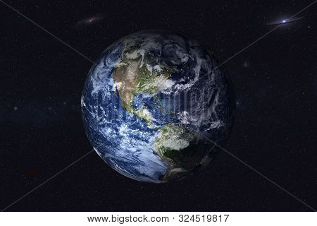 Planet Earth With Night City Lights In The Space With Far Galaxy On The Background. North And South 