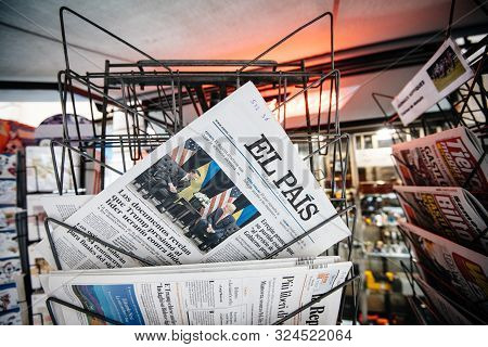 Paris, France - Sep 27, 2019: Newspaper In Press Kiosk Featuring El Pais Spanish Cover With Donald T