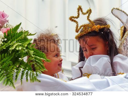 Cuenca, Ecuador - December 24, 2018: Christmas Parade Paseo Del Nino Viajero (traveling Child) In Ho
