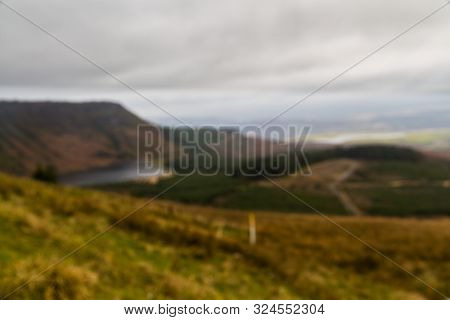 Blurred Image Of The Vale Of Neath, With Llyn Fawr Reservoir And Dam, From Hirwuan Common.  South Wa