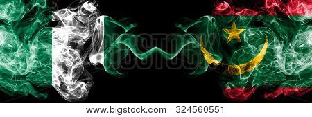 Nigeria Vs Mauritania, Mauritanian Abstract Smoky Mystic Flags Placed Side By Side. Thick Colored Si