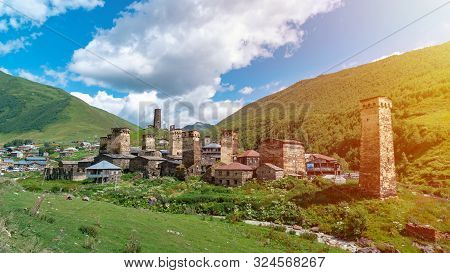 View Of The Ushguli Village At The Foot Of Mt. Shkhara. Picturesque And Gorgeous Scene. Rock Towers