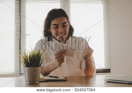 Happy Young Asian Employee Business Man Holding Money Bonus Card In Paper Envelope To Increasing Of 