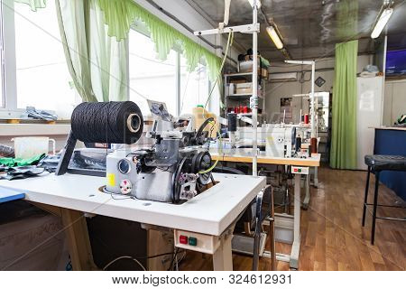 Professional Sewing Machine For Embroidery And Making Clothes In The Workshop.