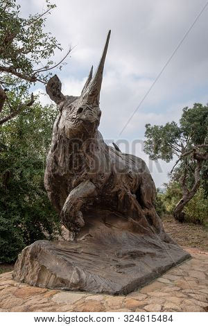 Hluhluwe, South Africa - May 2019: Amazing Bronze Statue Of A Black Rhinoceros In The Hluhluwe Natio