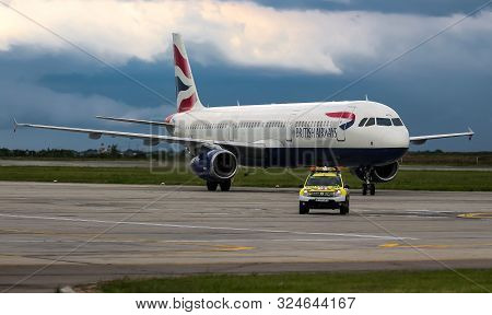Bucharest, Romania - July 15, 2019: The British Airways G-EUXG Airbus A321 (MSN 2351) aircraft is parked in the VIP reception area of ​​Henri Coanda Airport in Otopeni, 20 km. north of Bucharest.