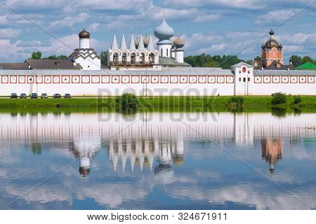 View Of The Domes Of The Old Tikhvin Assumption Monastery On A July Sunny Day. Leningrad Region, Rus