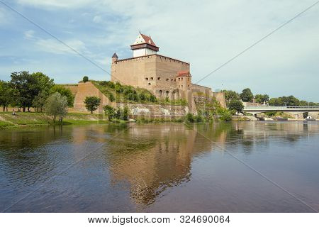 View Of Old Herman Castle On A Cloudy August Day. Narva, Estonia