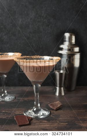 Chocolate Martini Cocktail In Glasses On Dark Wooden Background, Copy Space.