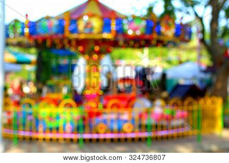 Children's Carousel. Photo With Blur Effect