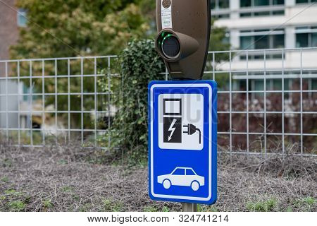 Amsterdam, Schiphol-rijk, The Netherlands, 09/27/2019, Electric Vehicle Charging Station. Eco-friend