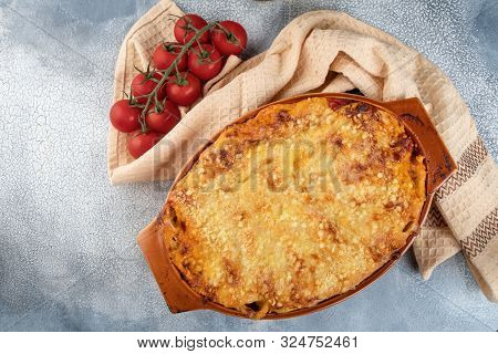 Traditional Italian  Cannelloni Vegetables, Minced Meat And Cheese. On A Wooden Background. Top View