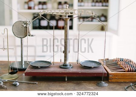 Old Pharmacy Scale Weight And Abacus. Old Pharmacy Interior With A Lot Of Medicine And Old Equipment