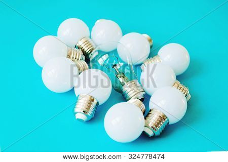 Lamps, Led Lamps And Fluorescent Lamps On Blue Background. Large Set Of Led Bulbs. White Energy-savi