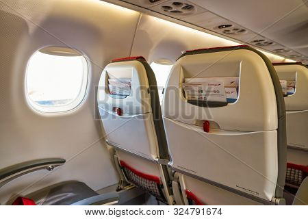 VENICE, ITALY - CIRCA MAY, 2019: interior shot of Austrian Airlines Embraer ERJ-195LR