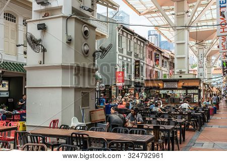 Singapore - March 22, 2019: Pillars Supporting Shade Pruducing Roof Over Food Street In Chinatown. B