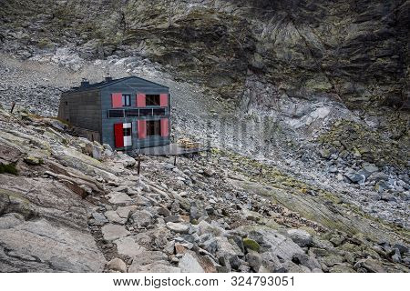 Cottage Under Rysy Peak On Rocky Ground In High Tatras, Slovakia