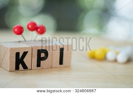 Letter Block In Word Kpi (abbreviation Of Key Performance Indicator). Metric Or Measurement To Achie