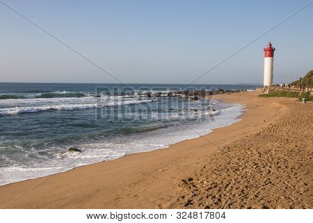 Footprinted Beach Leading Up To Umhlanga Lighthouse