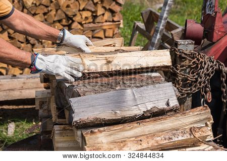 Wooden Logs Are Conceded For Winter As Firewood Stock - Close-up