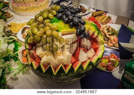 Watermelon And Grapes.festive Table Decoration At The Wedding