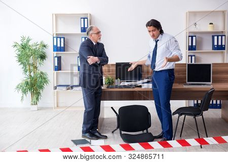 Forensic investigator investigating theft in the office