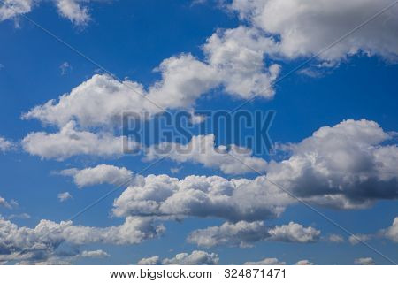 Bright Sunny Day, Cloudscape Full Of White Fluffy Cummulus Clouds