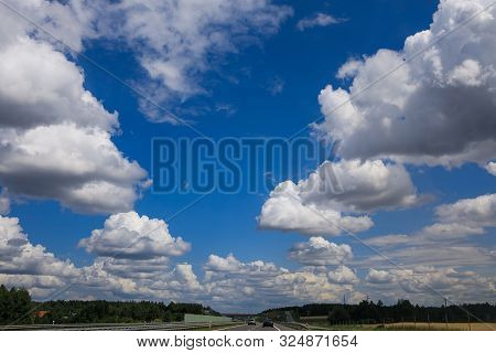 Bright Sunny Day, Cloudscape Full Of White Fluffy Cummulus Clouds