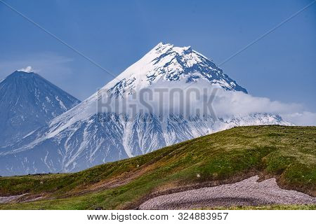 View On Kamen Volcano, Active Klyuchevskoy Volcano And Active Bezymianny Volcano.