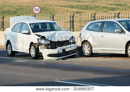car crash accident on street. damaged automobiles