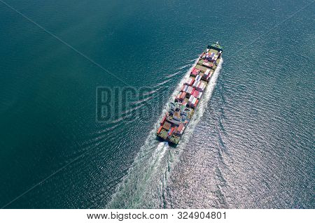 Aerial View Of The Large Volume Of Teu Container On Ship Sailing To The Sea Carriage The Shipment Fr