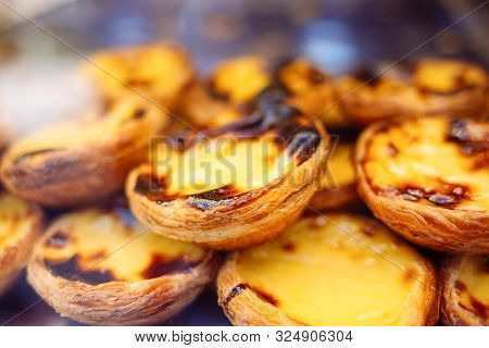 Traditional Portuguese Dessert - Pastel De Nata. Bakery Shop Window Display.