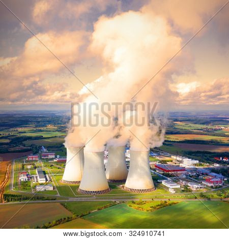 Aerial view to Temelin nuclear power plant.  This power station is important source of electricity for Czech Republic in European Union. Warm filtered photography.