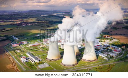 Aerial view to Temelin nuclear power plant.  This power station is important source of electricity for Czech Republic in European Union. Warm filtered photography.